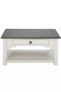 a white coffee table with black top and drawer on the bottom, in front of a white background