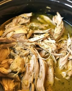 the food is being prepared in the slow cooker