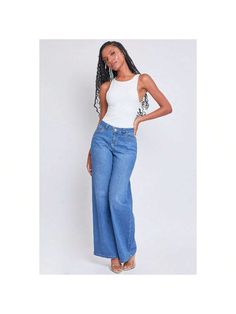 These Women's Low Rise Wide Leg Jeans will have you feeling too hot to handle! This jean is made with midweight stretchy denim and a low-waisted rise for your ultimate comfort, while the wide leg shape creates a flattering silhouette that elongates your legs. Constructed with a classic five-pocket construction and a front zip fly with single button closure. Style with a fitted crop and tennis shoes for a trendy street look, or swap your sneakers for heels to sass things up! 

Product Details: 
- Low Rise Wide Leg Jeans, Street Look, Women Essentials, Women Denim Jeans, Low Waisted, Kids Beachwear, Front Design, Tennis Shoes, Wide Leg Jeans