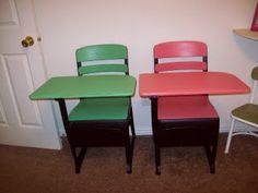 three children's chairs and a table in a room