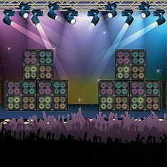 an image of a concert scene with lights and sound equipment on the stage as well as people dancing