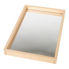 a wooden frame mirror on a white background