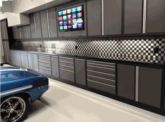 a car is parked in front of a garage with checkered tile on the wall