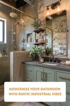 Modern bathroom with rustic industrial design, featuring a glass shower, stone wall accents, and green cabinetry with dual sinks.