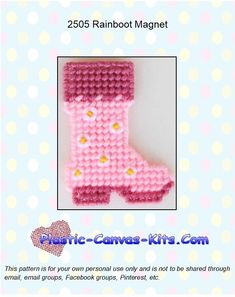 a crocheted pink boot with yellow hearts on it and the words,'rainboot magnet '