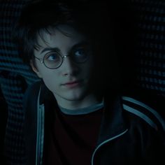 harry potter in glasses looking at the camera