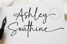 an ink pen sitting on top of a piece of paper with the words, ashley southern