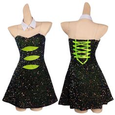 two mannequins dressed in black and green dresses with neon ribbons on them