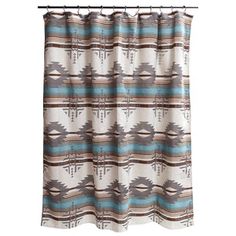 a shower curtain with a southwestern pattern on it