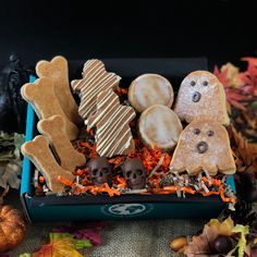 a box filled with halloween treats on top of a table