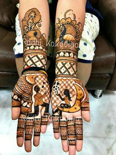 two hands with henna designs on them, one is decorated and the other has an elephant