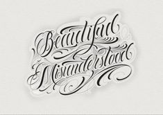 some type of lettering that looks like it is in the middle of an image with black ink