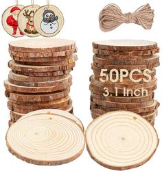 a stack of wooden slices next to some christmas ornaments and tags on strings with the words 50 pcs in each