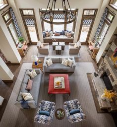 an overhead view of a living room with couches and chairs