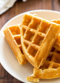 three waffles stacked on top of each other on a white plate