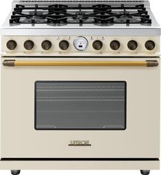 a white stove top oven with four burners and two oven doors on each side