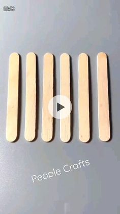 four wooden pegs with the words people crafts on them