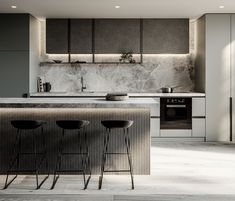 a kitchen with marble counter tops and bar stools