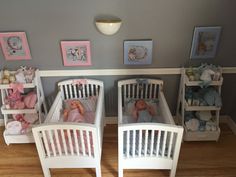 two baby cribs with stuffed animals in them