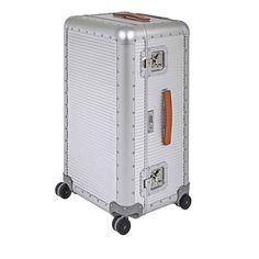 a white suitcase with wheels and an orange tag on the handle is shown in front of a white background