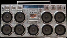 an old style radio with speakers on it's sides and a boom box in the middle