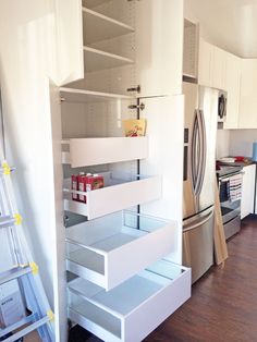 the kitchen is clean and ready to be used as a storage area for food items