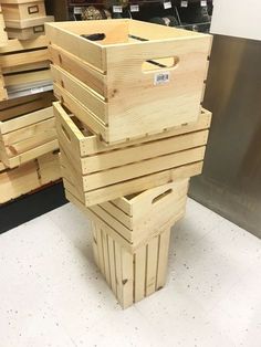 several wooden boxes stacked on top of each other