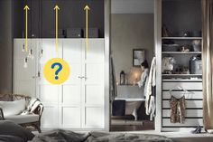 a bedroom with an open closet and yellow question mark on the door next to it