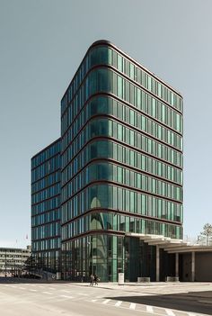 an office building with many windows on the side