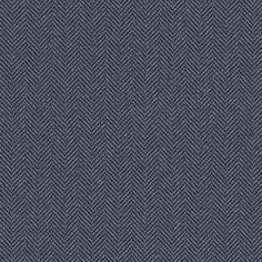 an upholstered blue fabric textured with herringbones, suitable to use as a background or wallpaper