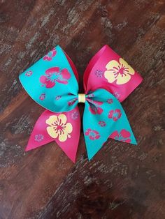 Tropical Cheer Bow/Softball Bow/ Dance Bow 3 inch wide ribbon with Glitter HTV attached. Colors can be changed. Hair Tie attached. Bows are made stiff. Cute Cheer Bows, Neon Bows, Dance Bows, Softball Bow, Custom Cheer Bows, Cheer Hair Bows, Glitter Cheer Bow, Pony O, Blue Cheer