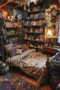 a bedroom with lots of books on the shelves and a bed in front of it