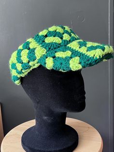 A fun summer hat that is adjustable . Handwash Trendy Crochet Hat For Spring, One Size, Crochet Cap One Size Fits Most, Trendy Crochet Hat For Spring, Trendy One Size Crochet Hat For Spring, Playful Green Beach Hat, Retro Crochet Cap For Summer, Knitted Summer Cap, Retro Crochet Hat For Spring Vacation, Trendy Beach Hats Hand Knitted