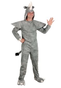 a man in a costume is standing with his hands out and wearing an animal suit