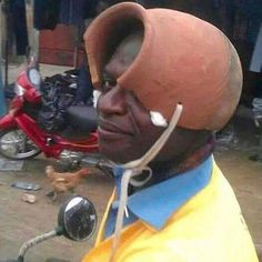 a man wearing a helmet on top of his head