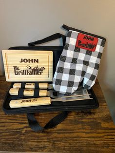 the john grollfater set is in its case and ready to be used