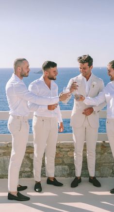 Men’s Coastal Wedding Attire, Groomsmen Attire Abroad Weddings, Men Outfit Beach Wedding, Destination Groomsmen Attire, Beachy Groom Attire, Wedding Abroad Outfit Men, Destination Wedding Suits Groom Attire, Groomsman Beach Wedding Attire, Beach Wedding Mens Attire Grooms