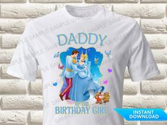 a white shirt with an image of the princess and prince hugging on it's chest