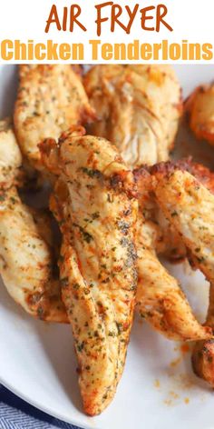 chicken tenderies on a white plate with text overlay that reads air fryer chicken tenderions