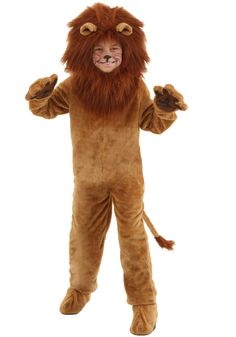 a man in a lion costume standing with his arms out and one foot on the ground