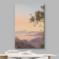 a painting hanging on the wall above a desk