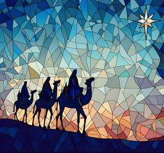 three wise men riding on camels through the desert