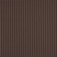 a brown wall with vertical lines on it