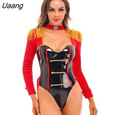 a woman in a black and red bodysuit with fringes on her chest, posing for the camera