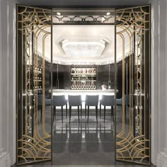 the entrance to a fancy bar with gold trimmings and glass doors that lead into it