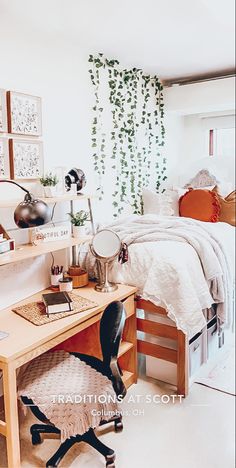 a bed room with a desk a chair and pictures on the wall above it's headboard