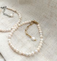 This bracelet is made of beautiful white freshwater pearls, and is a perfect and simple piece of jewelry that you can use everyday. Bracelet Size:  15cm + 5cm extension (for another size please leave us a note) Letter(s) Material: Stainless Steel Our bracelets are available in Gold or Silver.