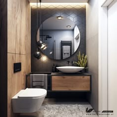 a bathroom with a toilet, sink and mirror in it's center wall area