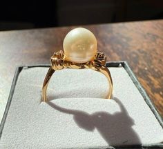 14k Vintage solid gold, diamond, and saltwater pearl ring with heart shaped settings. Signed DS. Size: 6.75 Excellent condition. Celtic Emerald Ring, Vintage Pearl Ring, Snake Ring Gold, Custom Birthstone Ring, Pearl Rings Vintage, Double Heart Ring, Snake Ring Silver, Green Stone Rings, Saltwater Pearls