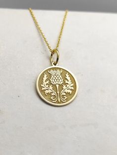 All parcels are shipped in one business day! For a speedy delivery to your address please select the upgraded shipping with a small extra cost. Engraved Thistle Design Necklace - Thistle Pendant Necklace - Handmade Thistle Gold Jewelry - Engraved Thistle Gold Necklace Engraved Thistle Pendant Necklace made out of 14K Solid Gold. Available only in Yellow Gold finish. An elegant piece of jewelry that is a perfect gift to yourself and your loved ones. Charm Thickness: 0.5mm Jump Ring inner diameter Thistle Jewellery, Thistle Necklace, Scottish Celtic, Thistle Design, Scottish Jewellery, Scottish Thistle, Solid Gold Necklace, Purchase Order, Jewelry Care Instructions